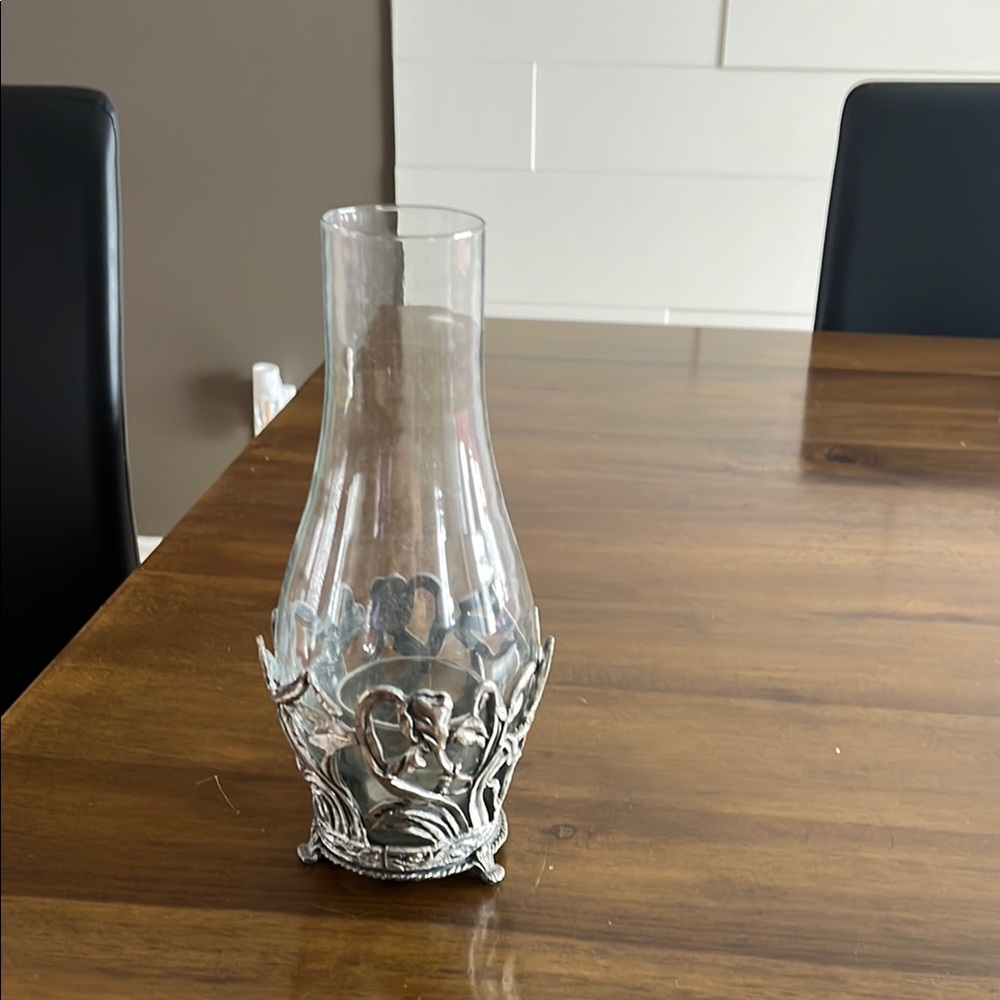 Silver and Gray Candle Holder with Intricate Design